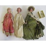 Three composition fashion dolls, with painted features, wigs, composition upper bodies with