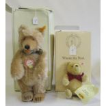 Two boxed Steiff teddy bears, comprising a 7 1/4" Winnie the Pooh and an 11 1/2" Teddy Baby 1930