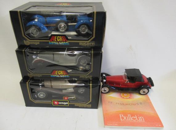 Three Burago 1/18 scale cars comprising Bugatti Type 39, Jaguar SS100 and Mercedes SSK, also