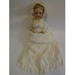A Kammer & Reinhardt bisque socket head character doll, with brown glass sleeping eyes, open