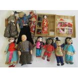 A collection of oriental dolls, comprising three pre-war opera dolls in original costumes, a boxed