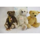 Three Steiff bears, comprising a 38cm Leopold bear with box, a 33cm 1909 brown bear, and a 37cm