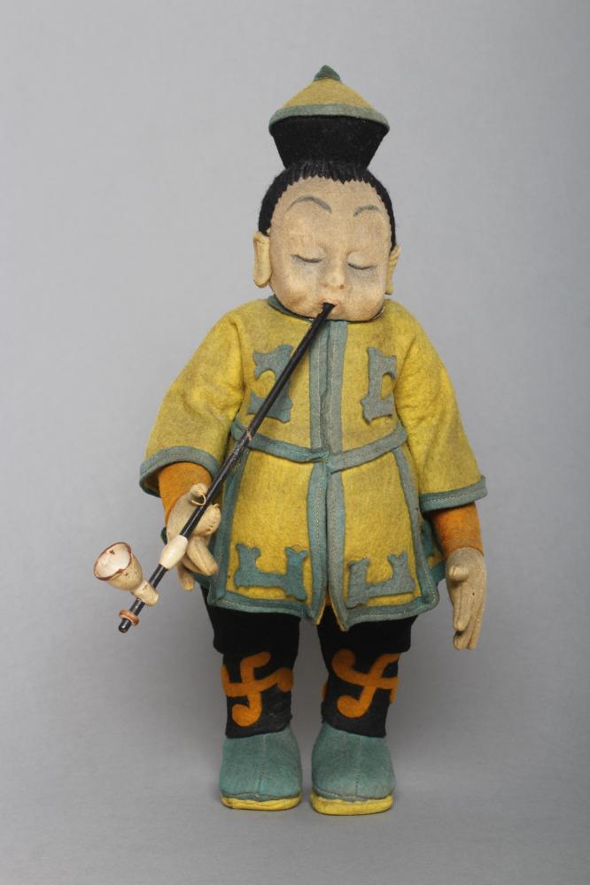 A rare pre-war Lenci opium seller doll, jointed shoulders, hips and neck, felt body and clothing,