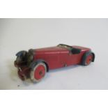 Meccano clockwork sports car in red/blue, some rusting and age to paintwork, white tyres (minor