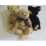 Three Steiff bears, comprising a 35cm 1920 bear, a 34cm 1953 black bear, and a 30cm classic bear (