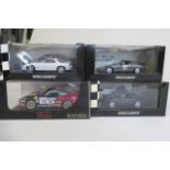 Three Minichamps Porsche limited edition model cars and a Saico Porsche 911 GT3R, all items boxed (