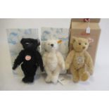 Three Steiff teddy bears, comprising a 27cm 1910 limited edition, a 28cm bear with elephant