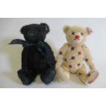 Two Steiff musical bears, comprising a 29cm English rose bear (playing Jerusalem), and a 29cm