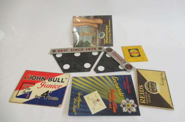 Seven small advertising signs in cardboard and tin, F-G (Est. plus 21% premium inc. VAT)