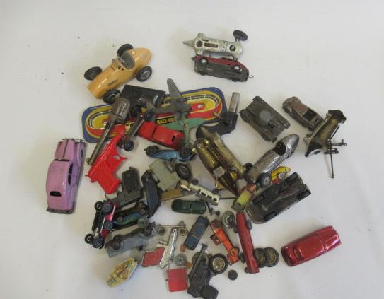 Playworn tinplate toys including race cars, saloons and clockwork tank (Est. plus 21% premium inc.