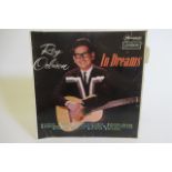 A signed Roy Orbison record slip for "In Dreams", bearing his autograph verso "To Carl" (Est. plus