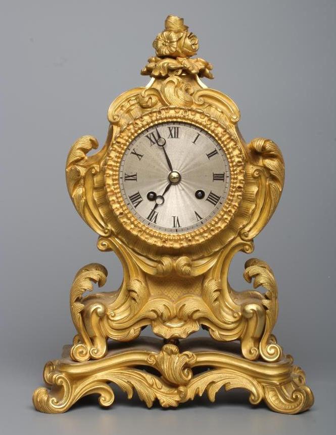 A FRENCH GILT METAL CASED MANTEL CLOCK, late 19th century, the twin barrel movement with anchor