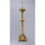AN IMPRESSIVE FRENCH GILT METAL TORCHERE BY CHERTIER PARIS in the Gothic revival style, second