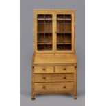 A ROBERT THOMPSON ADZED OAK BUREAU BOOKCASE, the upper section with half penny moulded cornice
