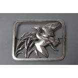 A GEORG JENSEN SILVER OBLONG BROOCH cast as a duck flying amidst bulrushes, stamped and numbered 300