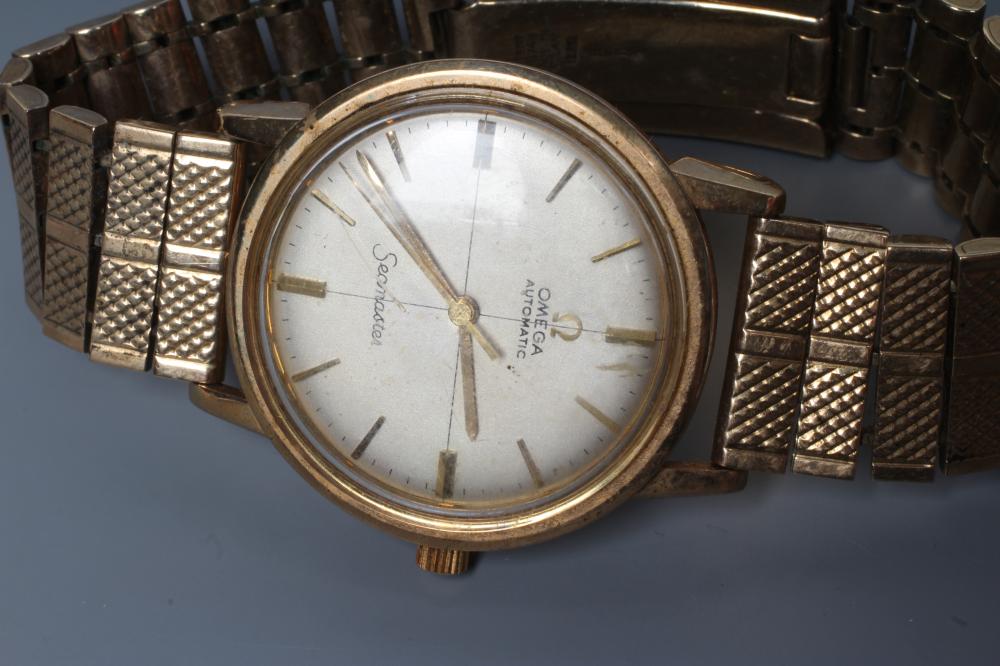 A GENTLEMAN'S 9CT GOLD OMEGA AUTOMATIC SEAMASTER WRISTWATCH, the pale champagne dial with applied - Image 2 of 4