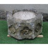A SUBSTANTIAL SANDSTONE PLANTER, 19th century, of deep circular form carved with a band of