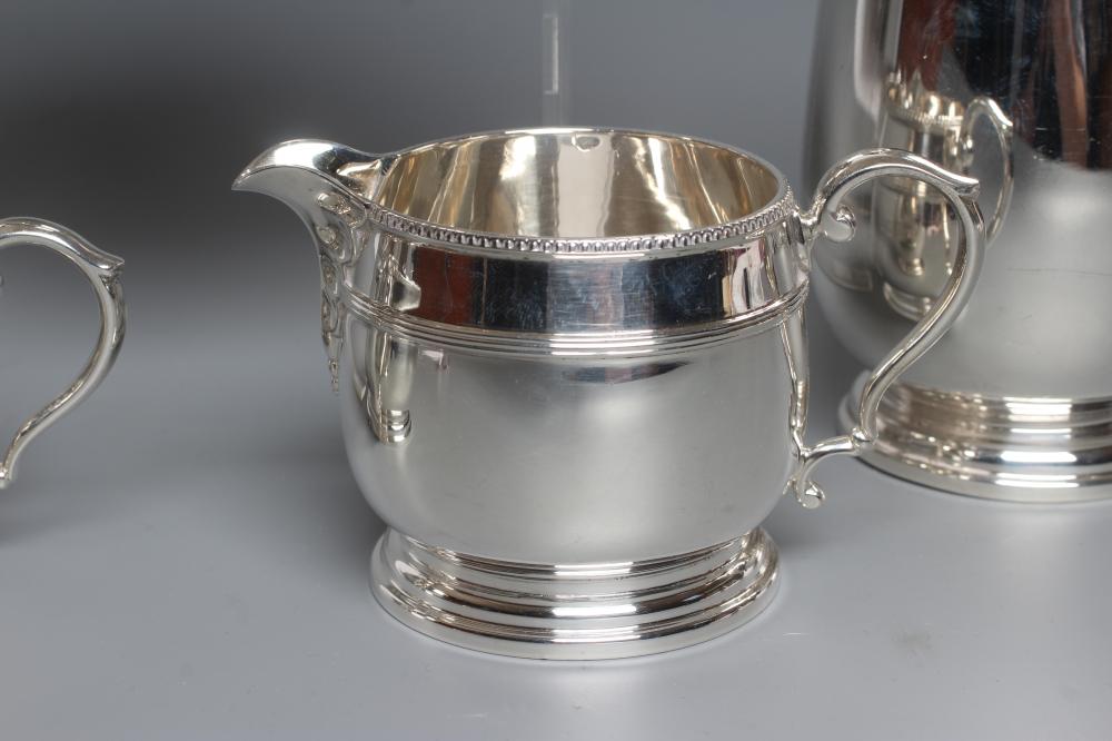 A FOUR PIECE TEA SERVICE, maker Fattorini & Sons, Birmingham 1930 and 1931 (hot water jug), of squat - Image 2 of 5