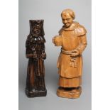 A CARVED LIMEWOOD(?) FIGURE OF A MONK, 20th century, modelled standing wearing an apron and