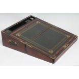 A VICTORIAN MAHOGANY AND BRASS BOUND LAP DESK, the lid inset with brass shield inscribed "Charles
