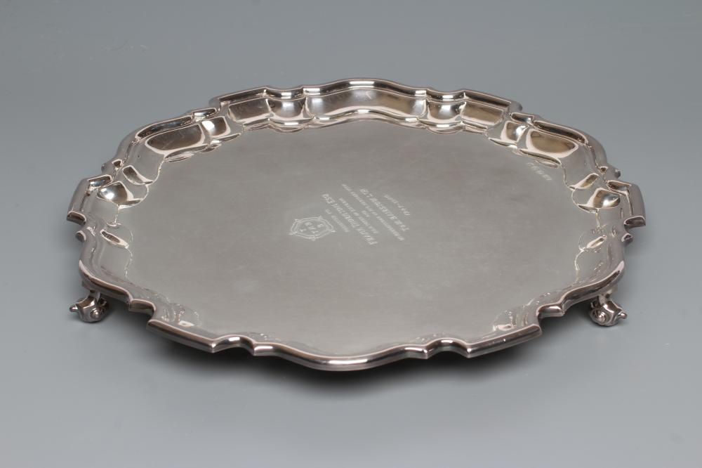 A SALVER, maker Viners, Sheffield 1960, of shaped circular form with pie-crust rim, centrally