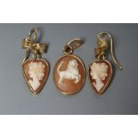 A PAIR OF SHELL CAMEO DROP EARRINGS, the heart shaped panels carved with a lady's head portrait,