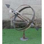 A WROUGHT IRON ARMILLARY SPHERE with spear head finial, on triangular stem and circular base, 28 1/