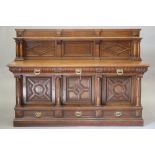 A VICTORIAN CARVED OAK SIDEBOARD BY MARSH, JONES & CRIBB, LEEDS, the raised panelled back with shelf