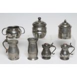 A COLLECTION OF PEWTER including a baluster half pint measure, 18th century, the flat lid with