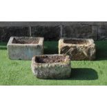 A SMALL SANDSTONE TROUGH, oblong, 15" x 10" x 7", together with two others, similar (3) (Est. plus