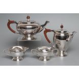 A FOUR PIECE TEA AND COFFEE SERVICE, maker Mappin & Webb, Sheffield 1974, of baluster form with