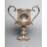 AN EDWARDIAN PEDESTAL TROPHY CUP, maker possibly Tom Frost, Birmingham 1904, of baluster form, the