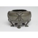 A TUDRIC PLANISHED PEWTER SMALL JARDINIERE, early 20th century, of rounded cylindrical form raised