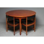 A McINTOSH TEAK DINING TABLE AND CHAIRS, mid 20th century, the extending D end table with two