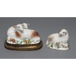 A MEISSEN PORCELAIN GROUP, early 19th century, modelled as two recumbent sheep on a flower encrusted