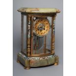 A FRENCH GREEN ONYX AND CHAMPLEVE ENAMEL FOUR GLASS MANTEL CLOCK, the twin barrel movement with