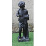 A VICTORIAN LEAD FIGURE OF A PUTTO modelled standing and holding a bird's nest, on square base, 7