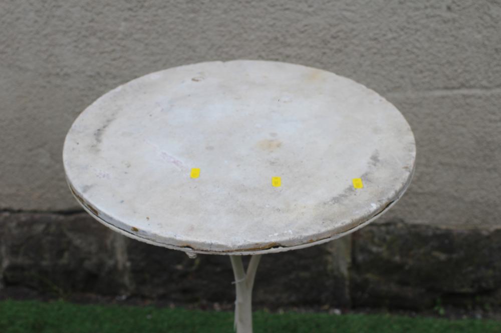 A CAST IRON BISTRO TABLE, the circular white marble top on plain turned stem, raised on scrolled and - Image 3 of 3