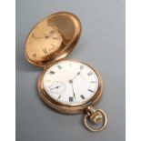 A 9CT GOLD TOP WIND WALTHAM HUNTER POCKET WATCH, the white dial with black Roman numerals