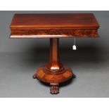 A VICTORIAN MAHOGANY FOLDING TEA TABLE, the oblong swivel top with concave frieze on collared