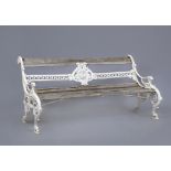 A CAST IRON GARDEN BENCH, c.1900, with wooden slatted seat and top rail, the horizontal splat