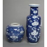 A CHINESE PORCELAIN ROULEAU VASE painted in underglaze blue with the Cracked Ice and Prunus pattern,