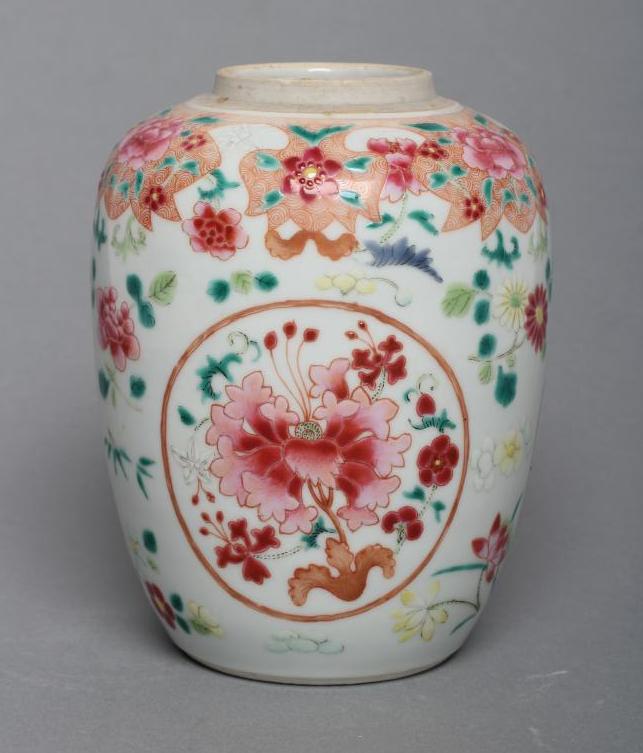 A CHINESE PORCELAIN FAMILLE ROSE JAR of ovoid form painted with roundels of peonies on a scattered