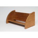 A ROBERT THOMPSON ADZED OAK BOOK TROUGH, the quadrant ends carved with mouse trademark in high