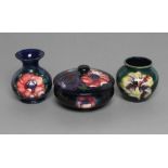 A SMALL MOORCROFT POTTERY VASE, mid 20th century, of globular form tubelined and painted with the