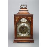 A WALNUT CASED BRACKET CLOCK, early 20th century, the twin barrel movement with anchor escapement