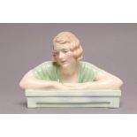 GLADYS - A ROYAL DOULTON CHINA BUST, HN1740, inscribed and printed marks in green, 4 3/4" high (Est.