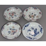 A PAIR OF CHINESE PORCELAIN SOUP PLATES AND A MATCHING PLATE painted in underglaze blue and over