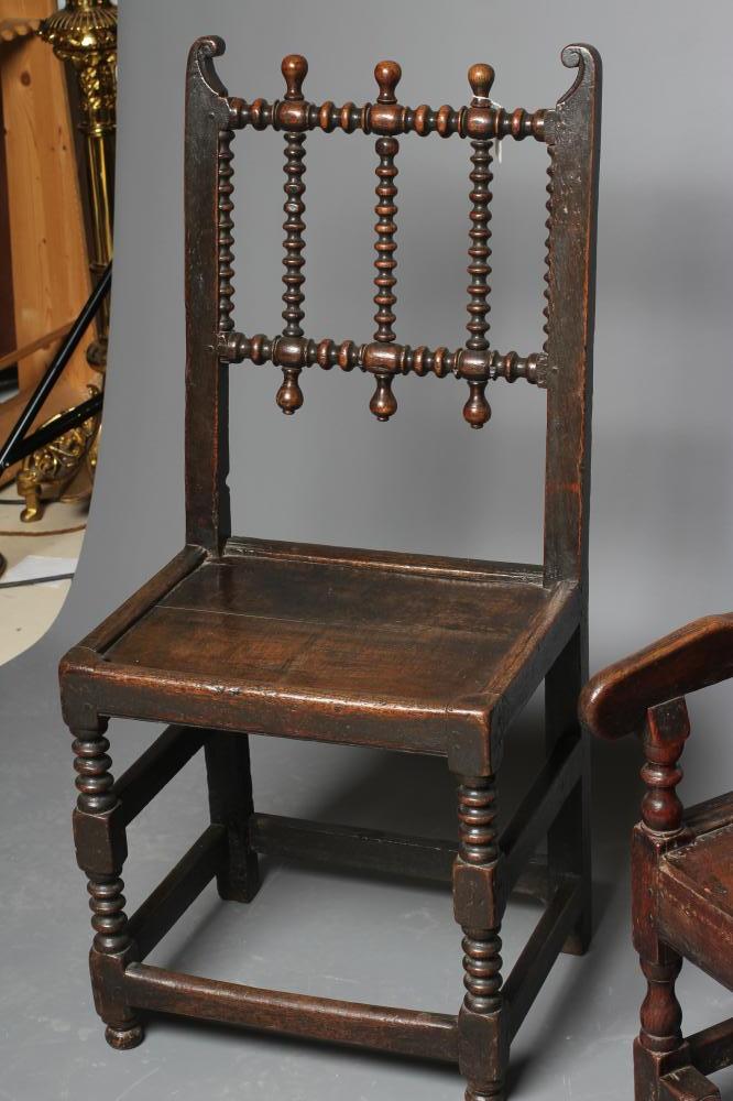 A JOINED OAK ARMCHAIR, early 18th century, the twin panelled back with waved top rail, shaped - Image 2 of 4