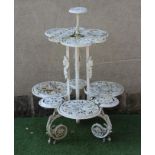 A VICTORIAN CAST IRON CONSERVATORY PLANT STAND of lobed two tier form pierced and moulded with